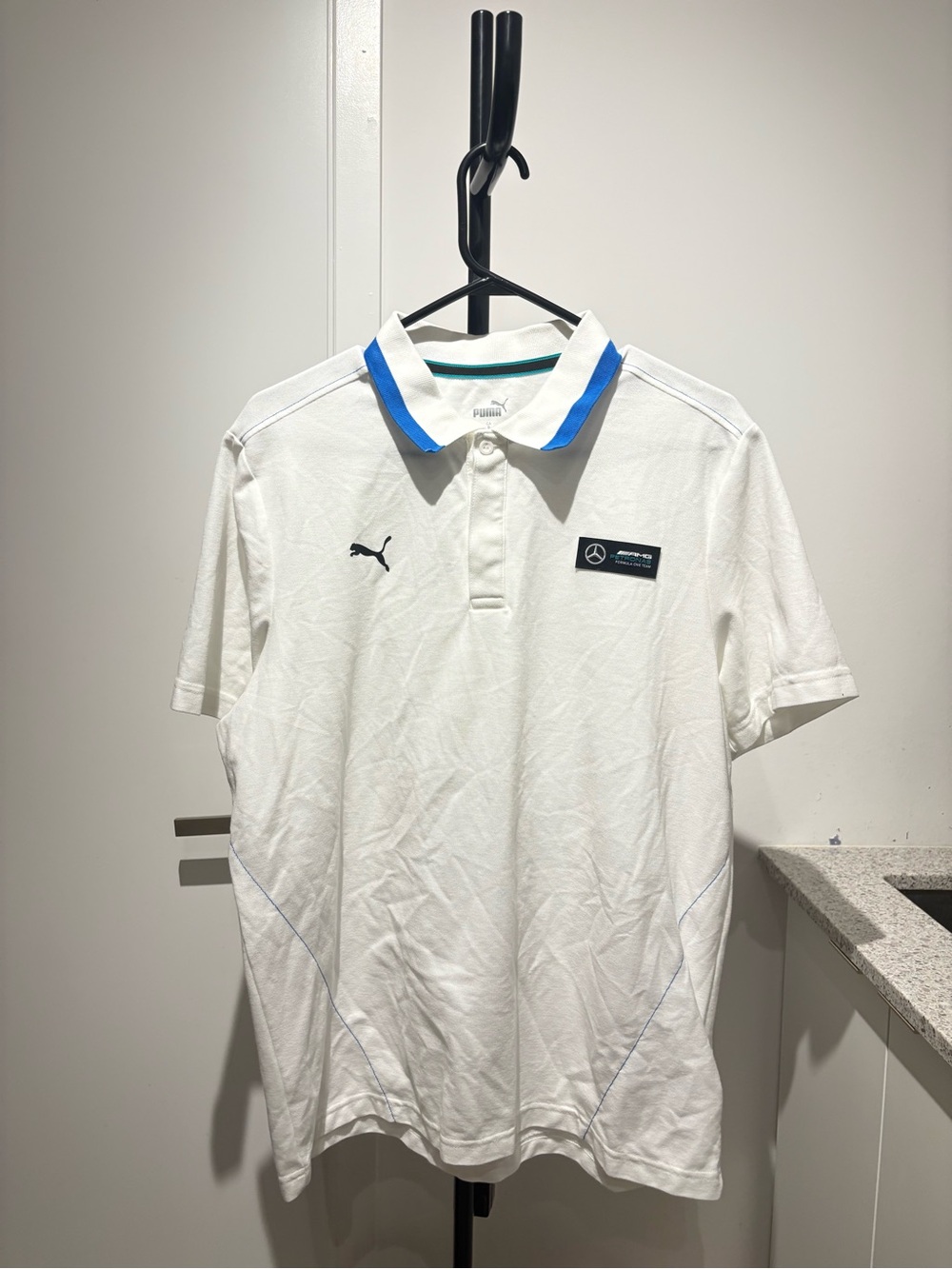 Puma White Polo with Blue Collar Trim